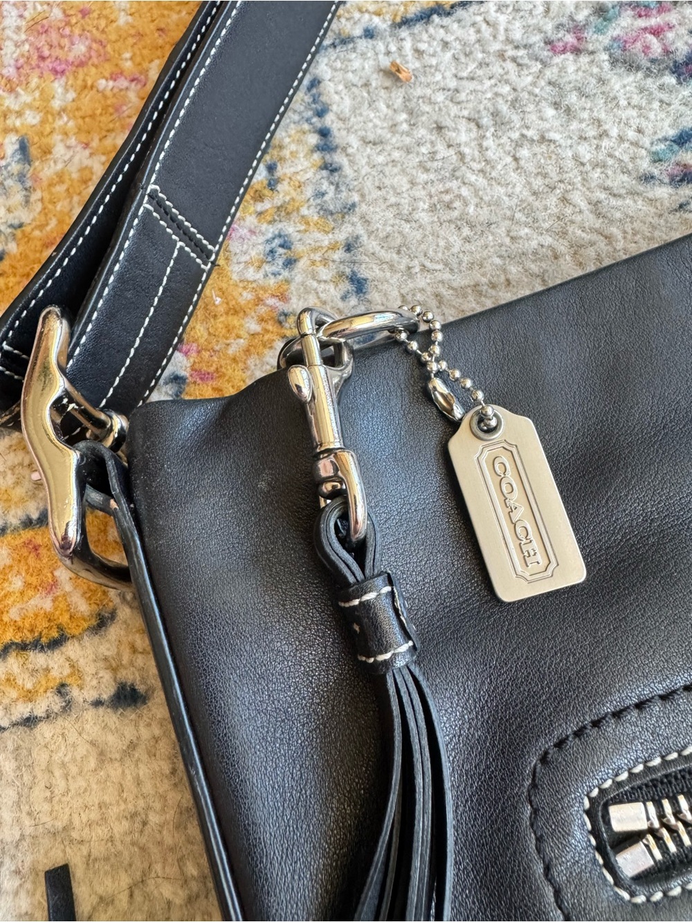 Coach Black Leather Shoulder Bag with Silver Hardware and Tassel